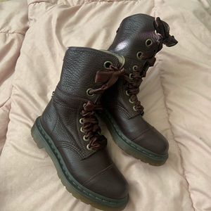 Lace up Dr.Marten boots with “silk” laces.